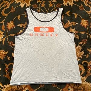 🏖🌊 OAKLEY ORANGE BRAND LOGO GRAPHIC MENS LIGHT BLUE SLEEVLESS BEACH TANK TOP